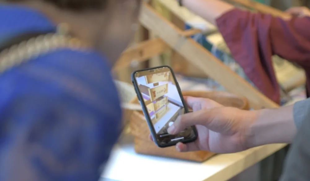 The AR layer running on a guest’s phone.